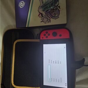 Nintendo Switch with Red Joy-Con in Black Carry Case